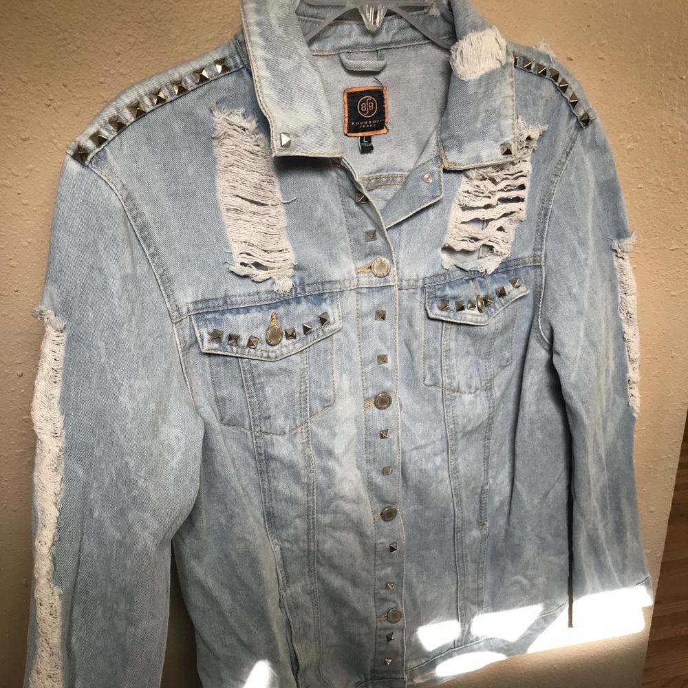 Distressed denim jacket